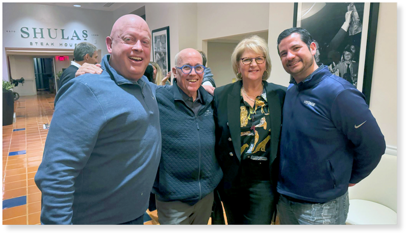 Dennis with group of CEOs at conference